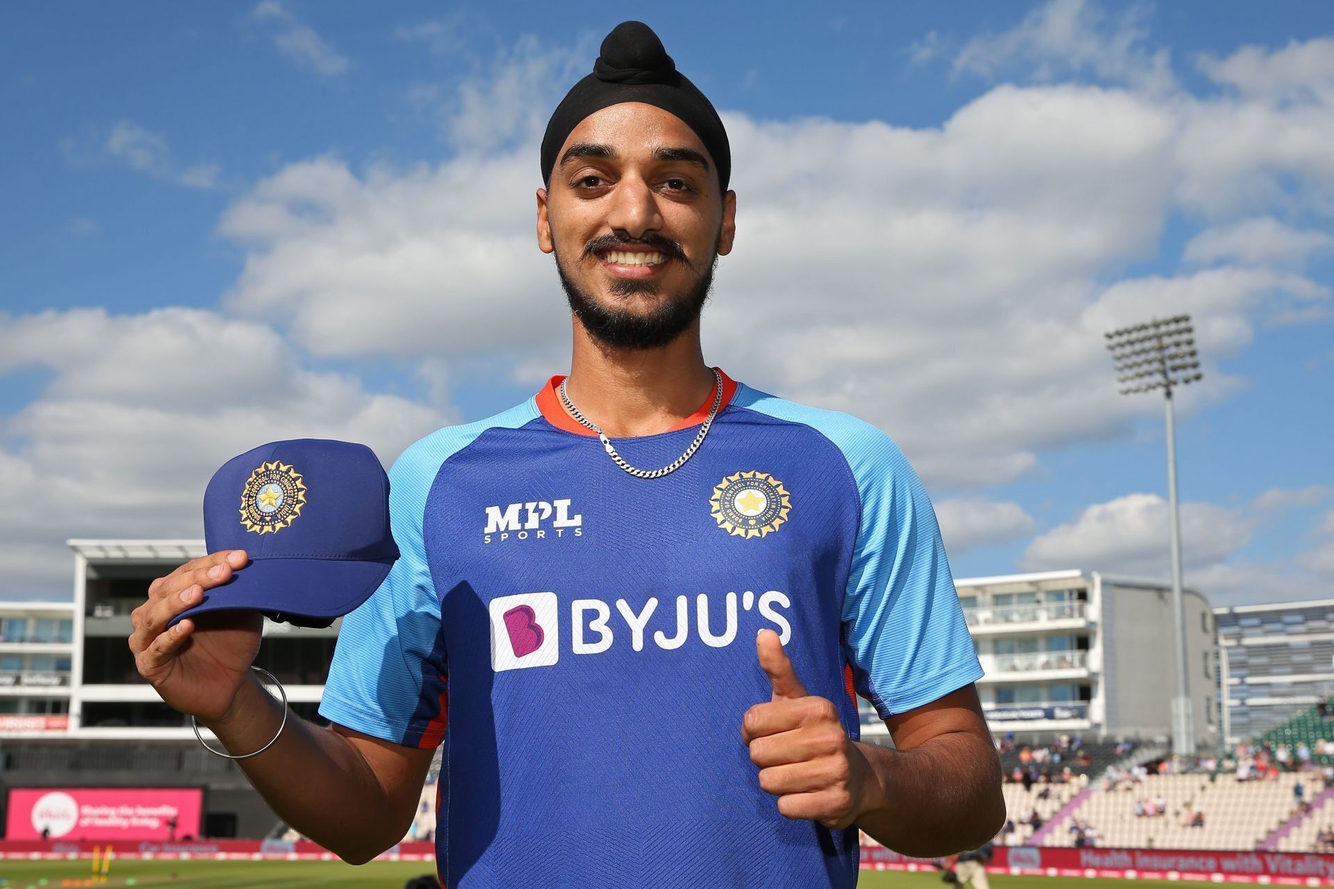 Arshdeep Singh poses with his debut cap.