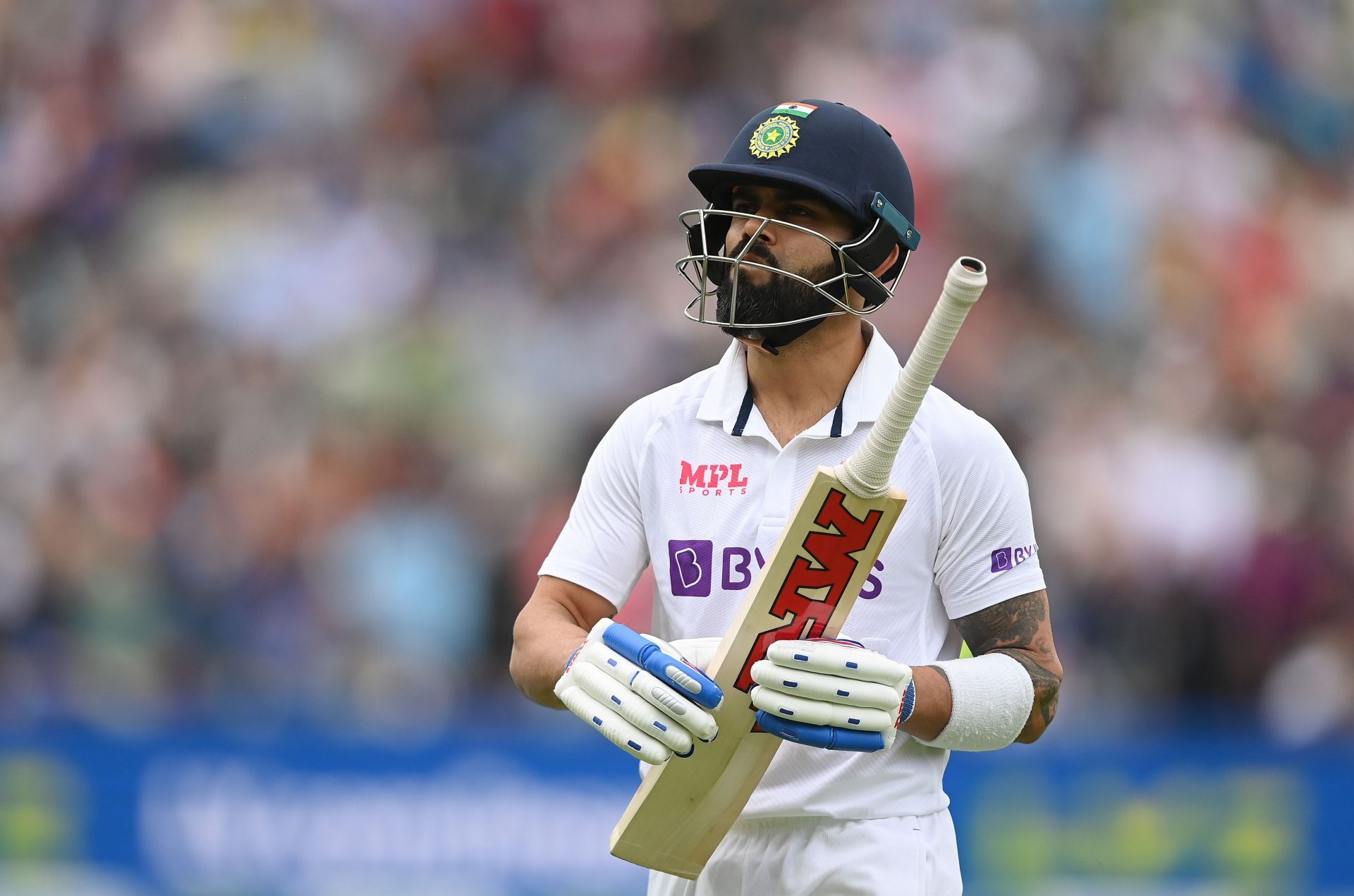 Virat Kohli walks back after being dismissed on Day 3 of the Birmingham Test. Pic: Getty Images