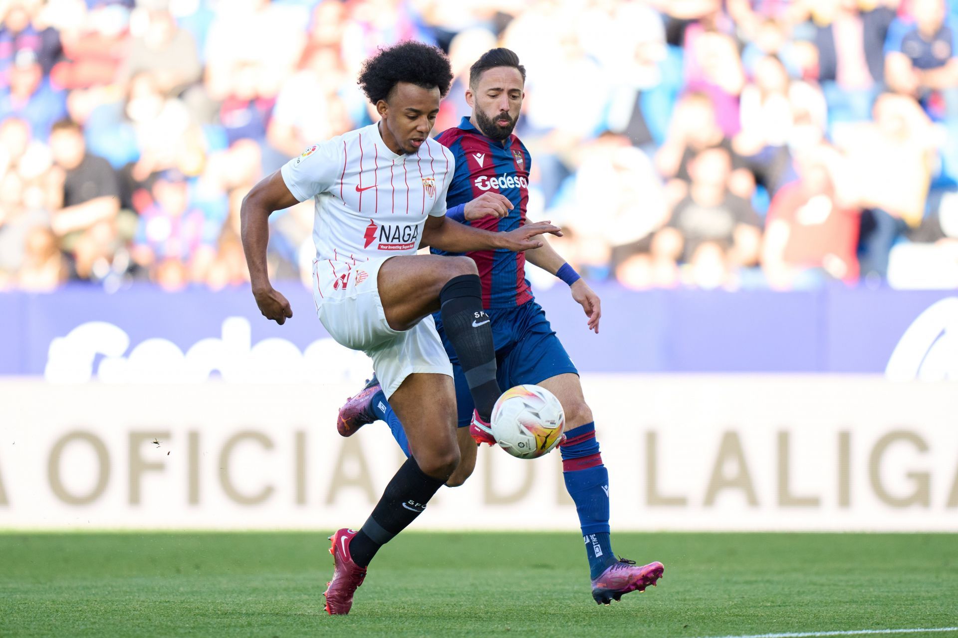 Jules Kounde has arrived at the Camp Nou.