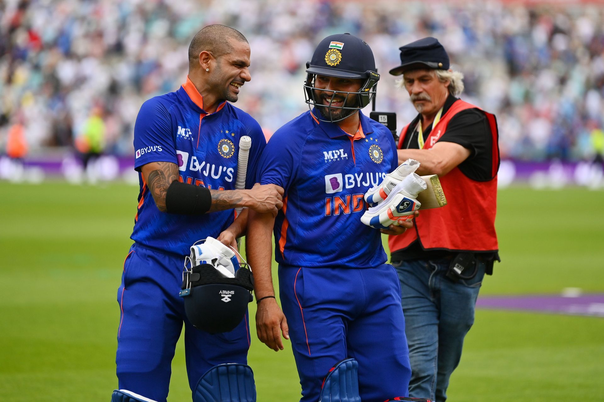 Shikhar Dhawan (left) and Rohit Sharma walk off after India&rsquo;s win in the first ODI. Pic: Getty Images