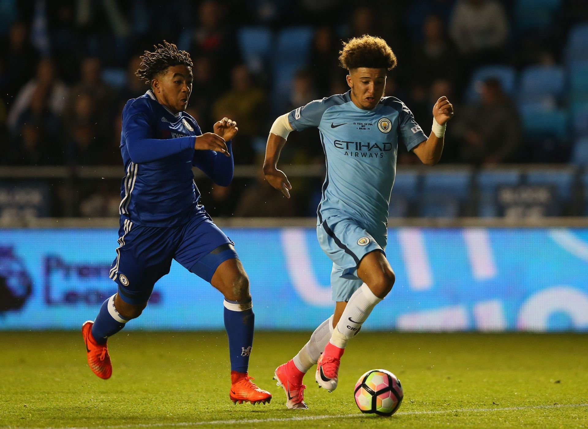 Jadon Sancho (R) in action for Manchester City against Chelsea