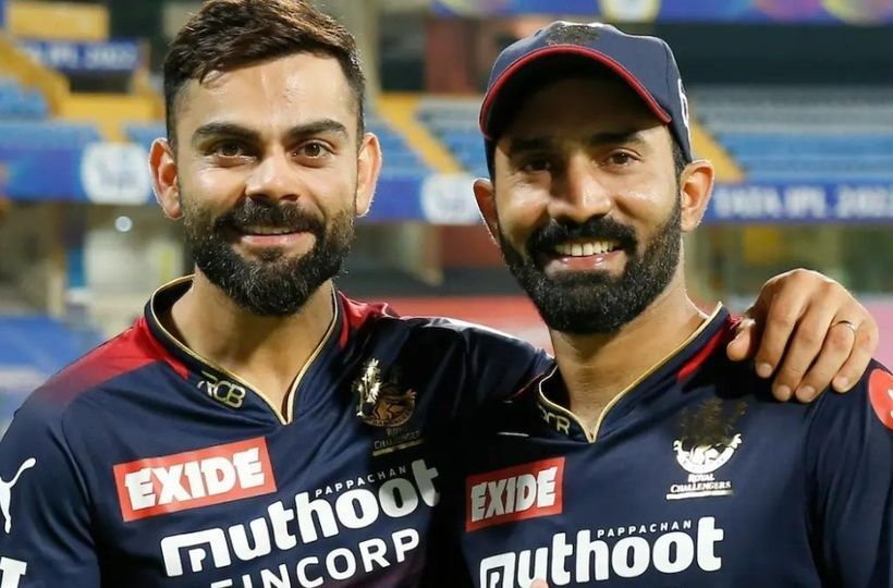 Dinesh Karthik (right) has backed Virat Kohli to rediscover his touch