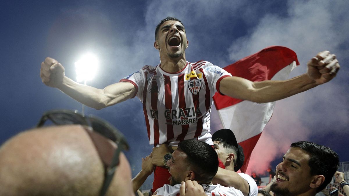 AC Ajaccio fans and players celebrate promotion to Ligue 1