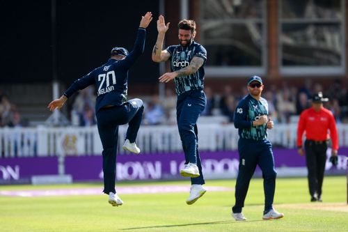 Reece Topley celebrates with Jason Roy after dismissing Shikhar Dhawan. Pic: Getty Images