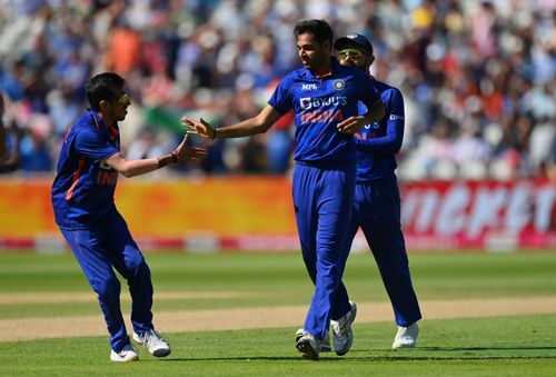 Bhuvneshwar Kumar celebrates with teammates after taking the wicket of Jason Roy. Pic: Getty Images