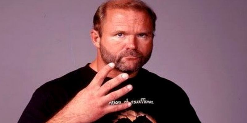 Arn Anderson displaying what the Four Horsemen refer to as the &#039;Symbol of Excellence&#039;