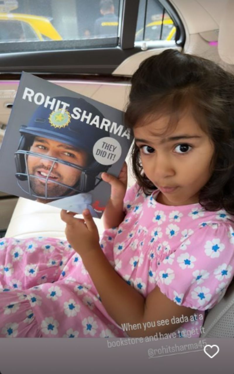 Samaira proudly displays the book about the current Indian captain.