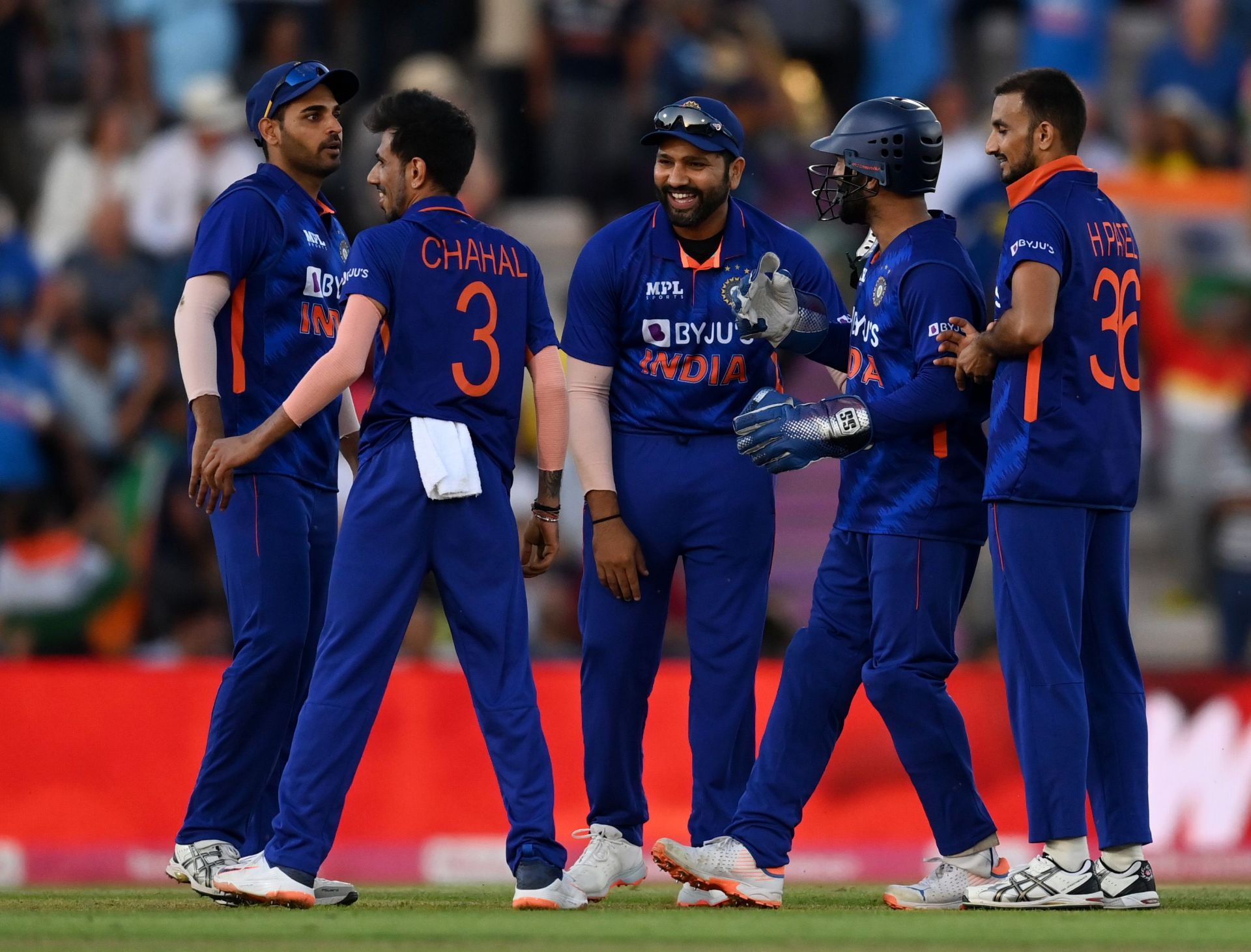 Rohit Sharma celebrates a wicket with teammates in England. Pic: Getty Images