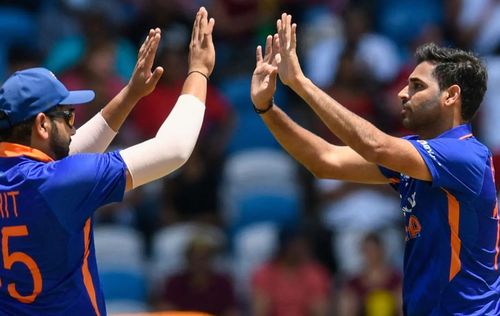 Rohit Sharma (L) with Bhuvneshwar Kumar (R).