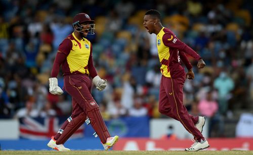 Nicholas Pooran (left) has instilled a lot of belief in Akeal Hosein (right) and Hayden Walsh Jr.