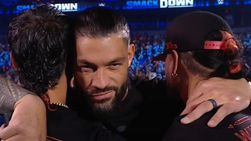 Left to right: Jey Uso, Roman Reigns, and Jimmy Uso