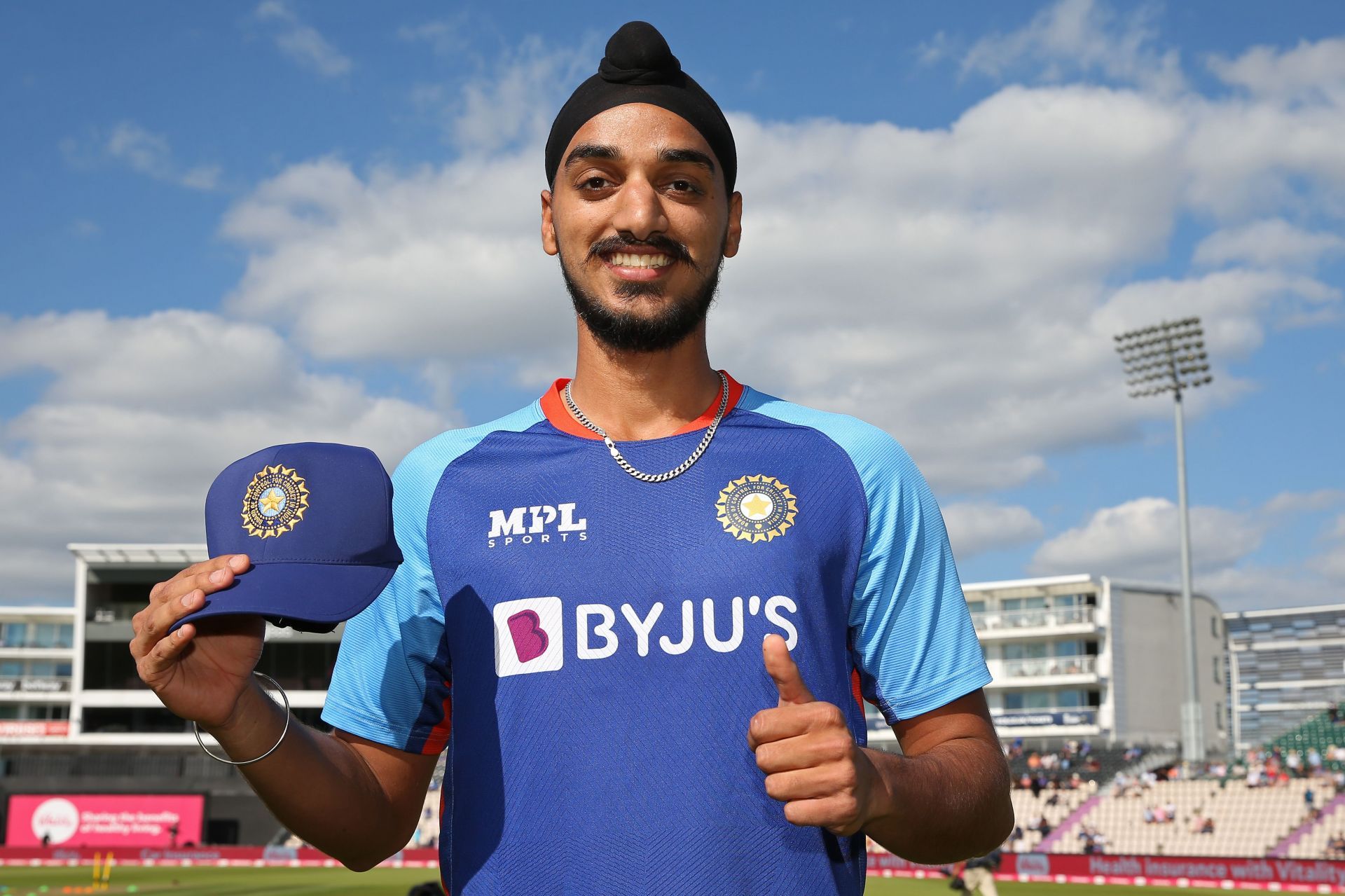 Arshdeep Singh poses with his cap ahead of his T20I debut. Pic: Getty Images