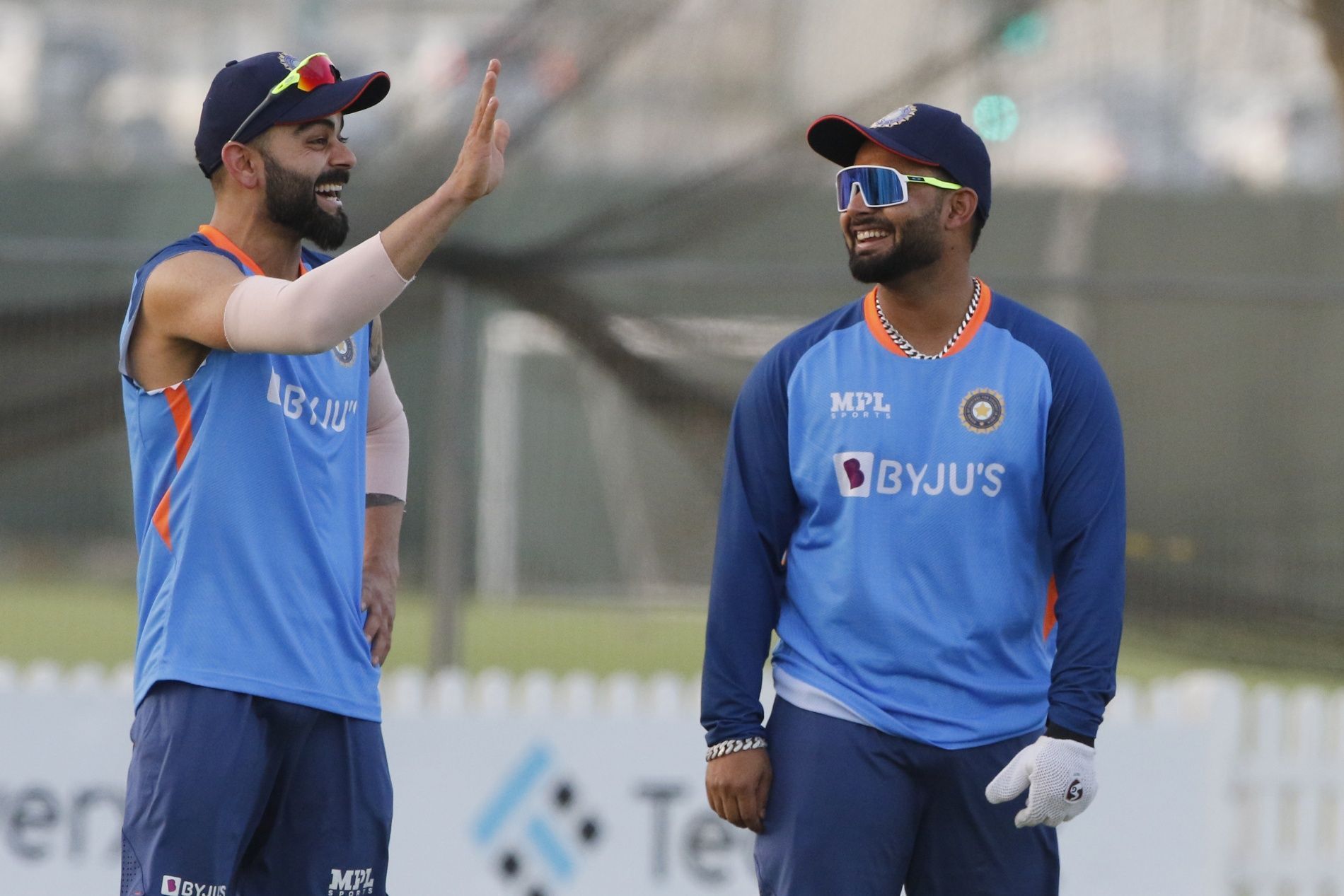 Virat Kohli (left) and Rishabh Pant.