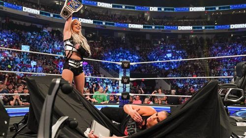 Liv standing tall after Shayna Baszler was put through a table on SmackDown