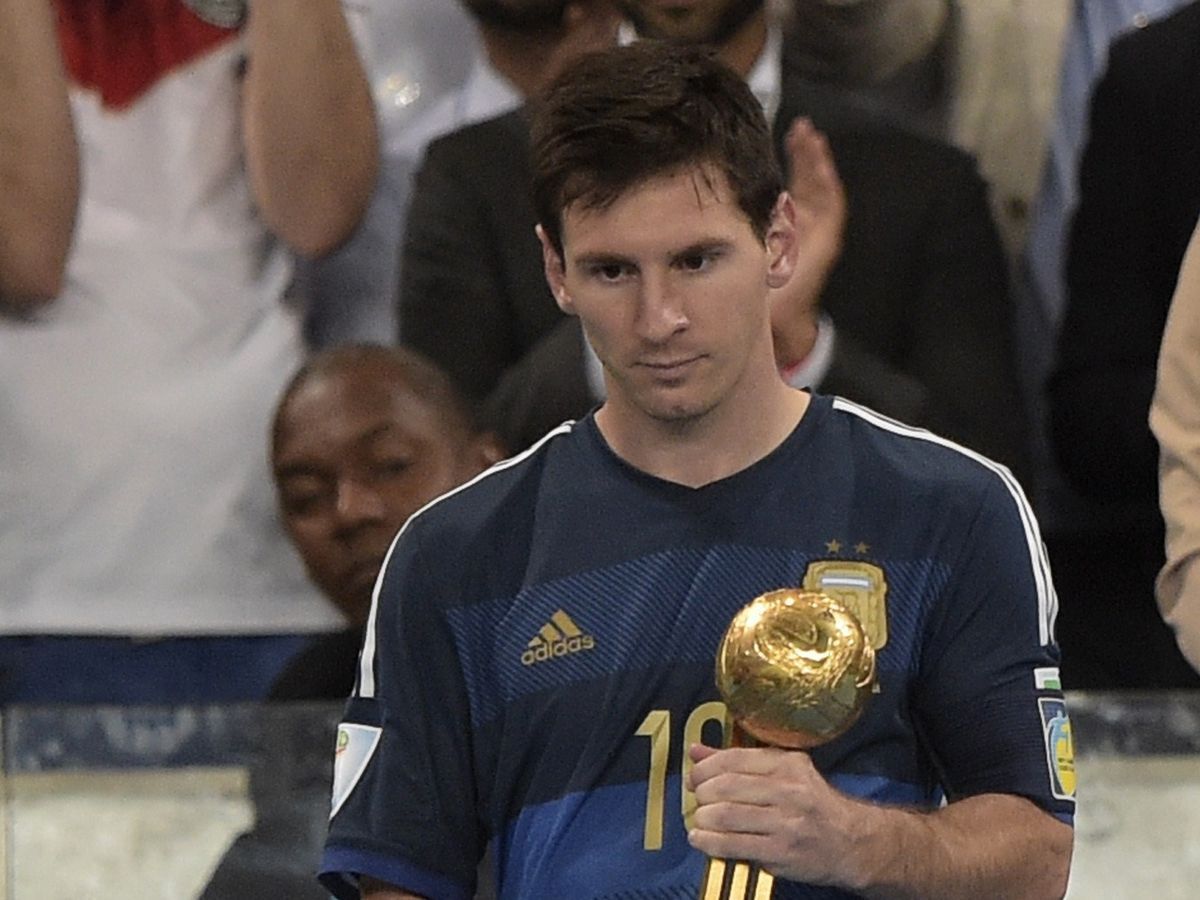 Lionel Messi with the Golden Ball at the 2014 FIFA World Cup (photo courtesy: The Mirror)