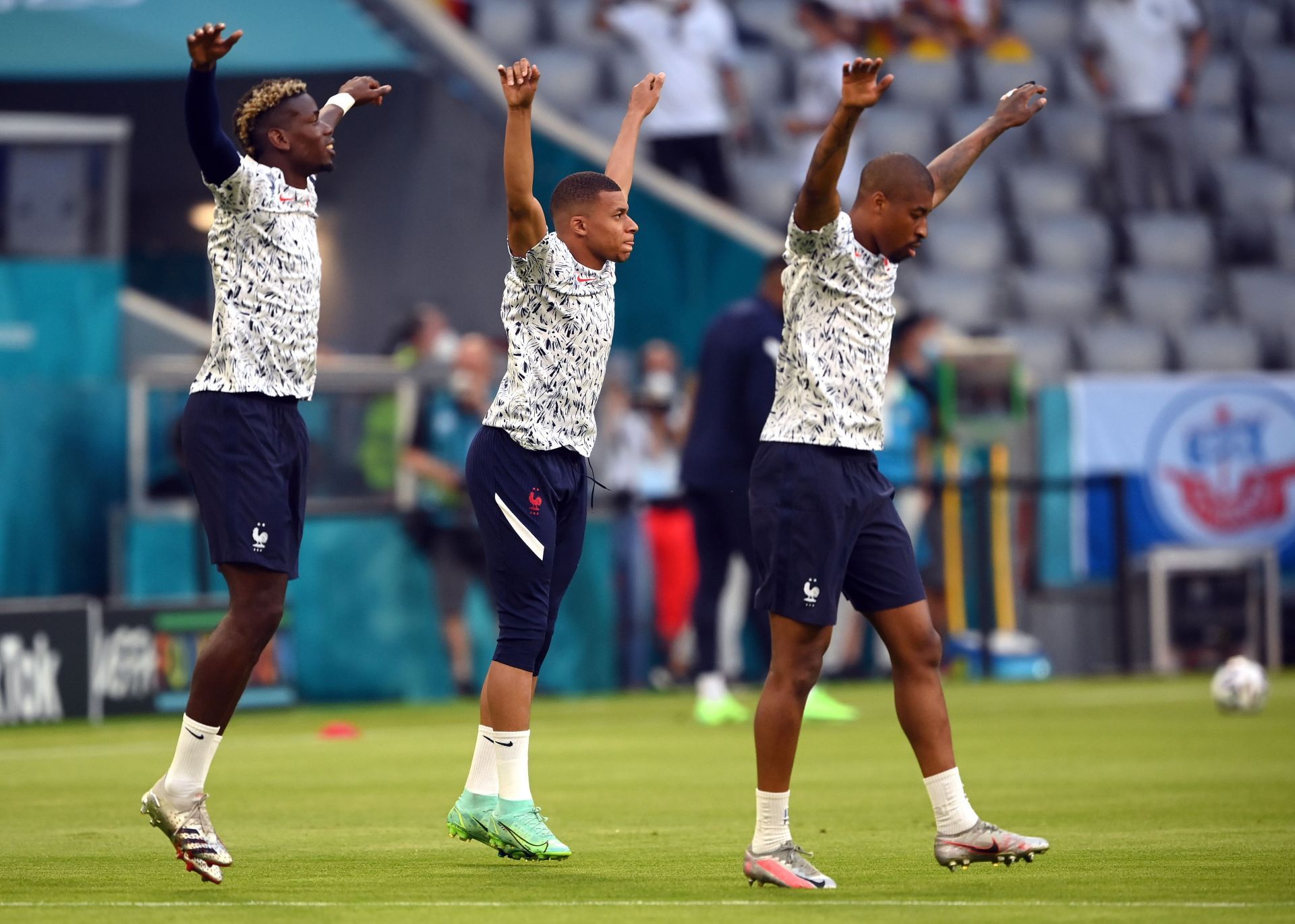 Paul Pogba and Kylian Mbappe training