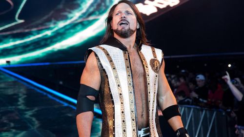 Former WWE Champion AJ Styles walks down the entrance ramp