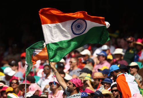 Indian cricket fans supporting their team with full enthusiasm