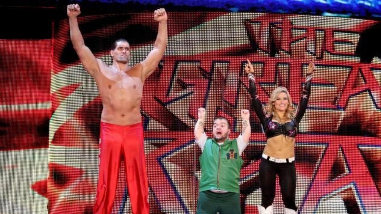 The Great Khali (L), Hornswoggle (M), Natalya (R)