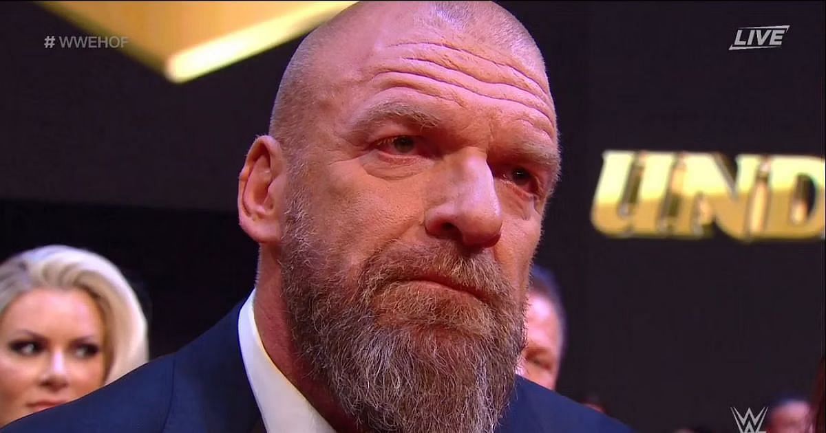 The Game at the WWE Hall of Fame ceremony in 2022