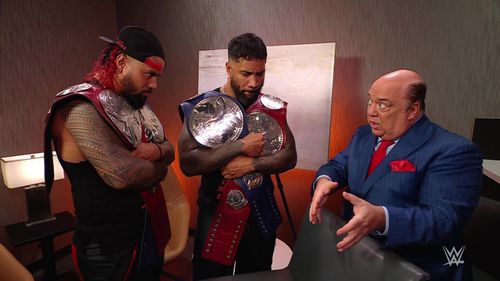 Undisputed WWE Tag Team Champions The Usos and Paul Heyman