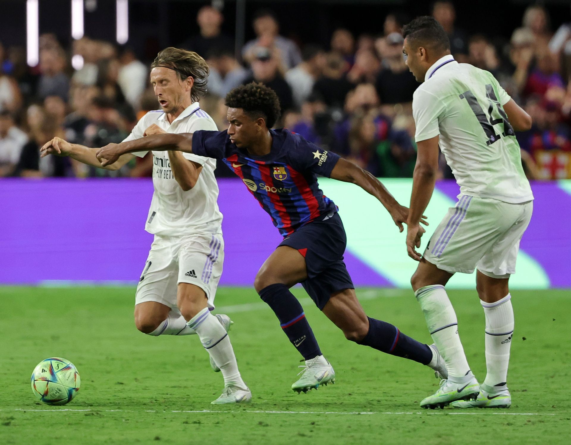 Modric in action against Barcelona in a Preseason Friendly