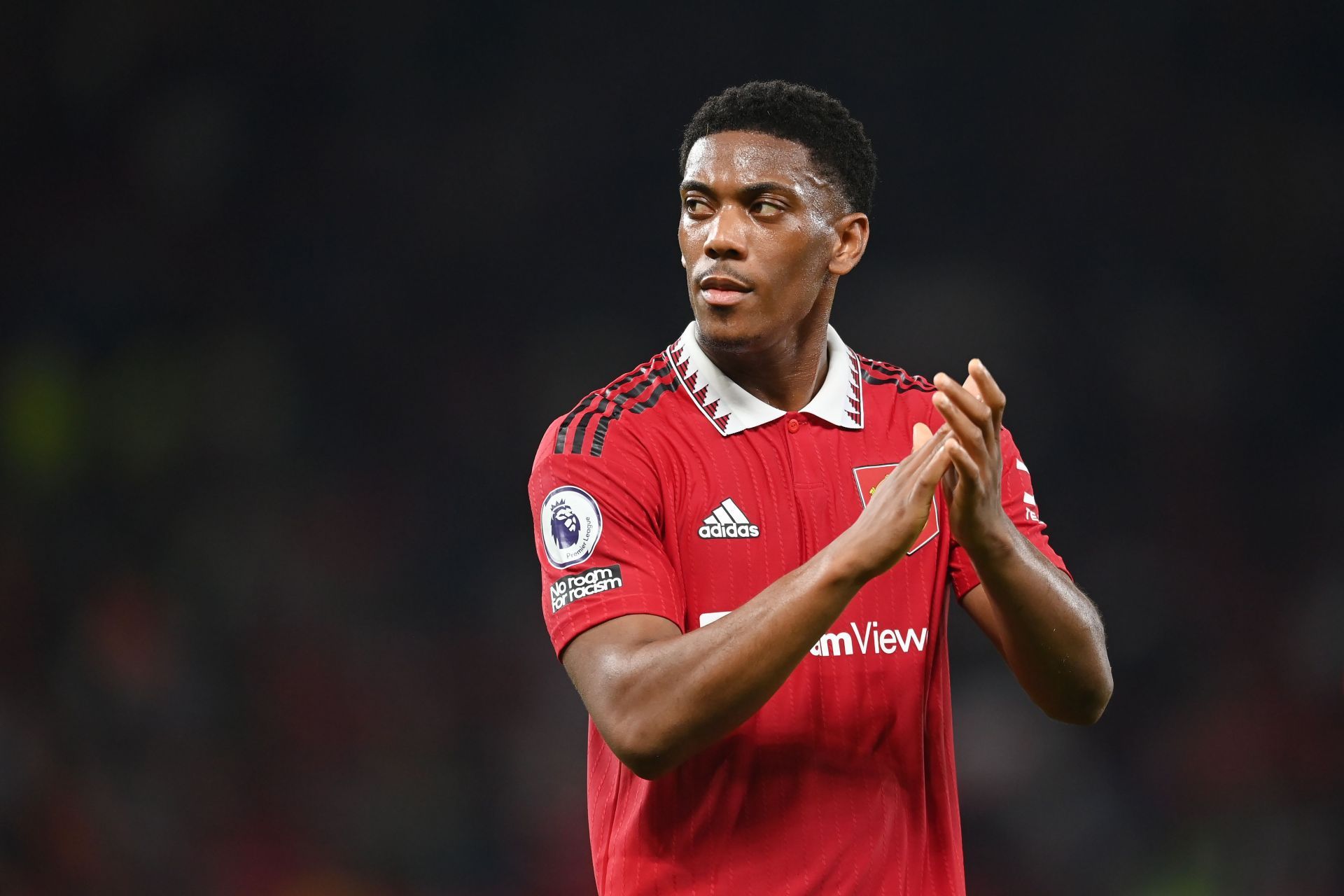 Anthony Martial applauds the fans after the game against Liverpool FC - Premier League