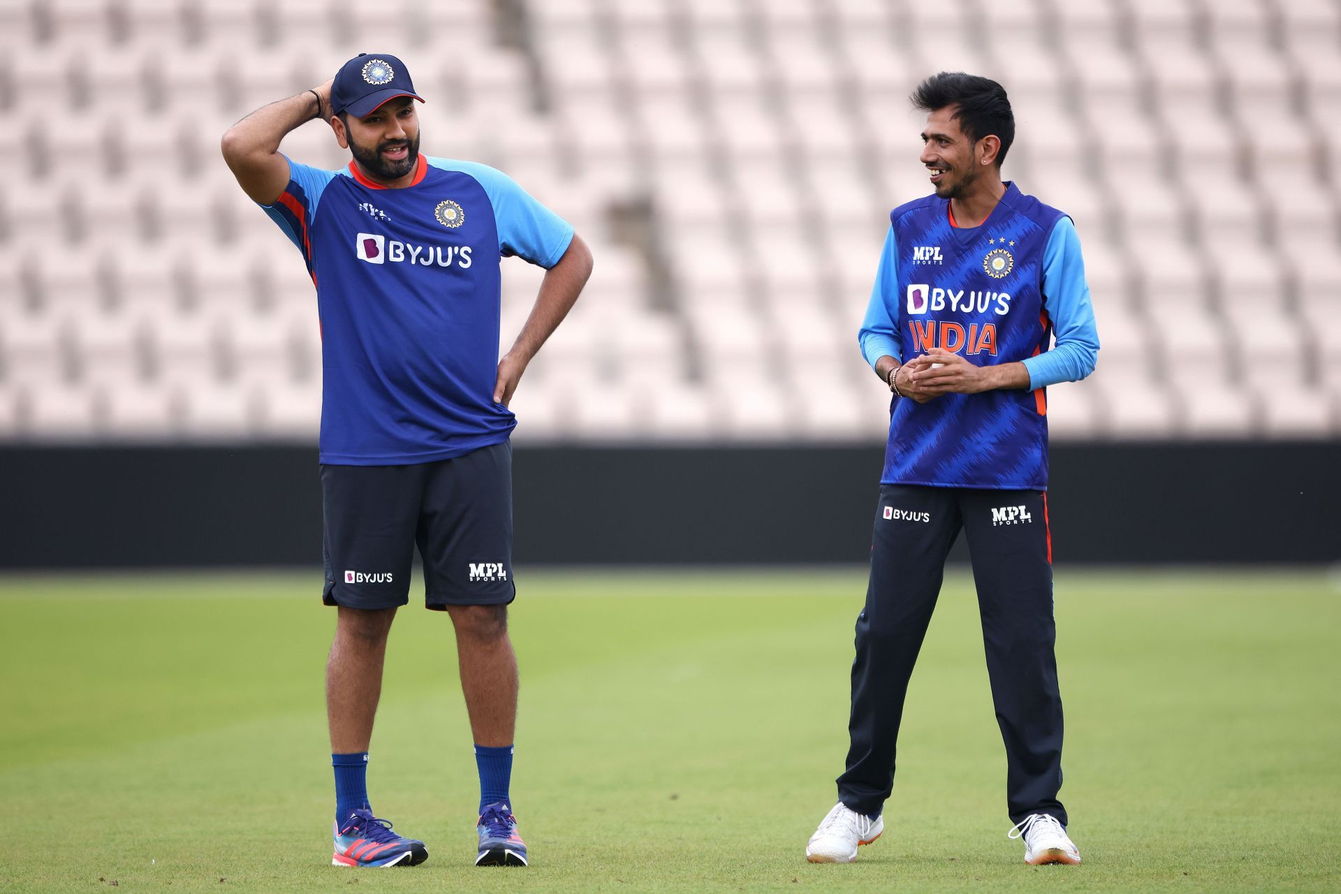 Yuzvendra Chahal (R) chats with the Indian captain. Pic: Getty Images