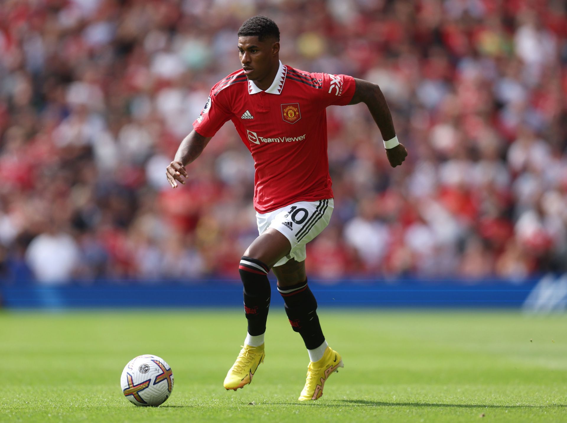 Marcus Rashford in action against Brighton &amp; Hove Albion - Premier League