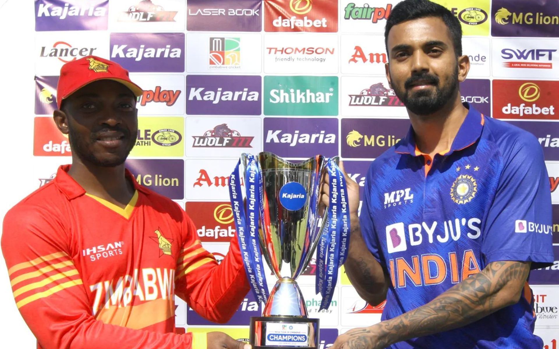 Skippers Regis Chakabva (left) and KL Rahul (right) pose with the trophy ahead of the first ODI (Source: Instagram)