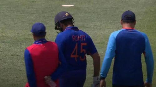 Rohit Sharma walked off along with the physio as he didn't want to aggravate the niggle. (P.C.:Twitter)