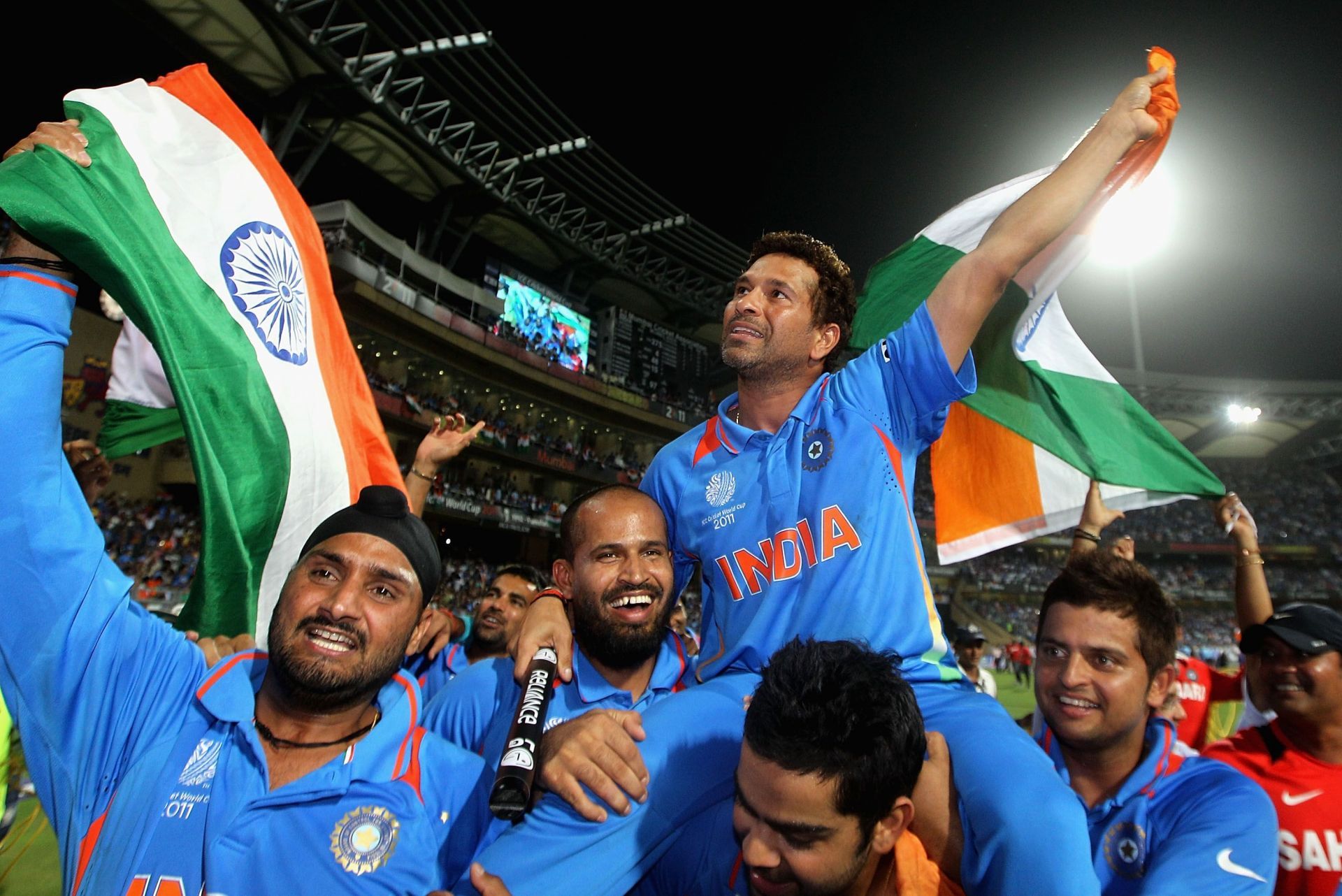 Virat Kohli carries Sachin Tendulkar on his shoulders for lap of honor after winning the World Cup in 2011.