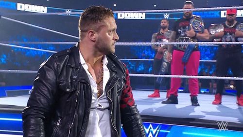 Karrion Kross stares at WWE Universal Champion Roman Reigns