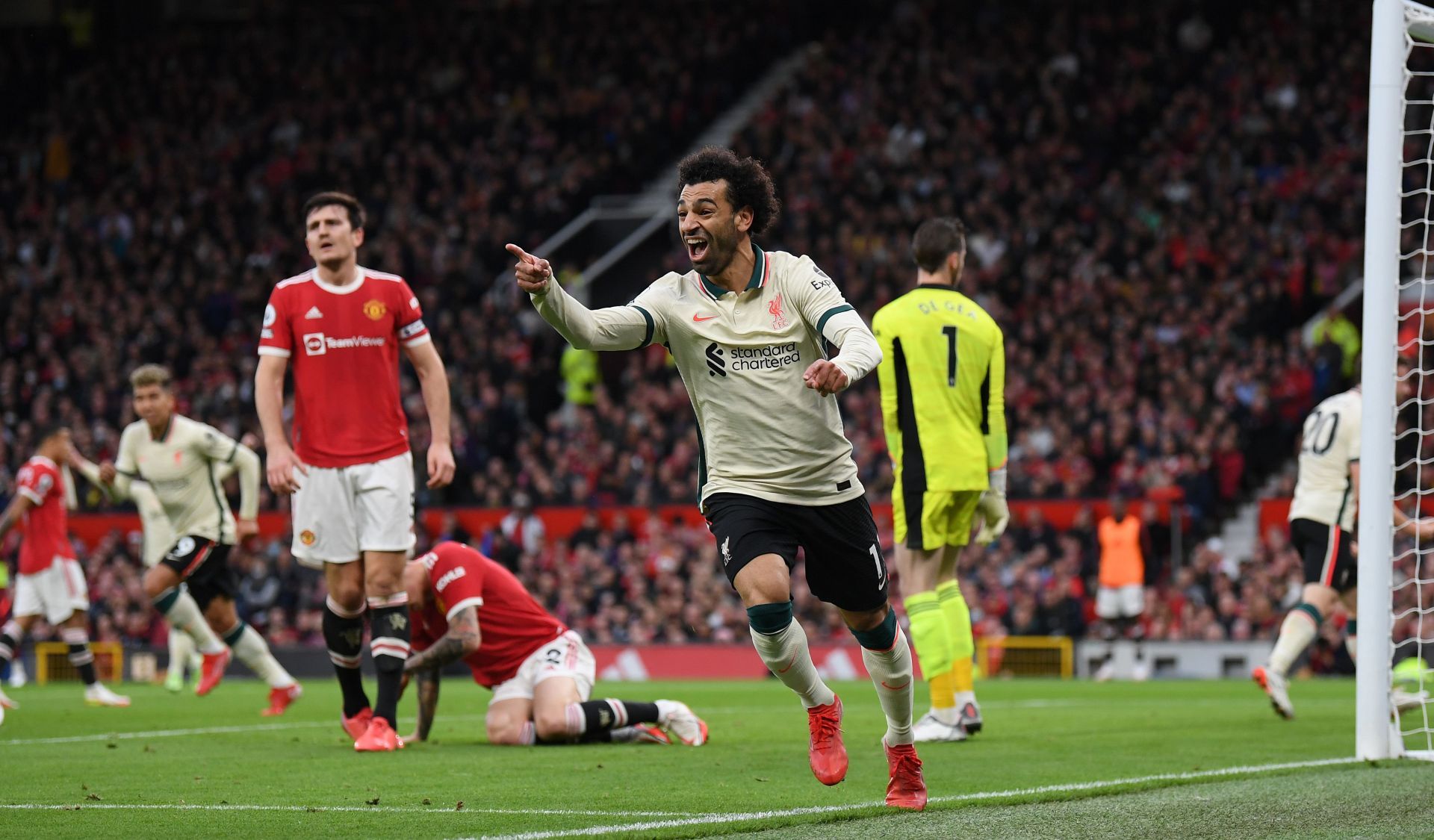 Mohamed Salah celebrates after scoring a goal against Manchester United - Premier League