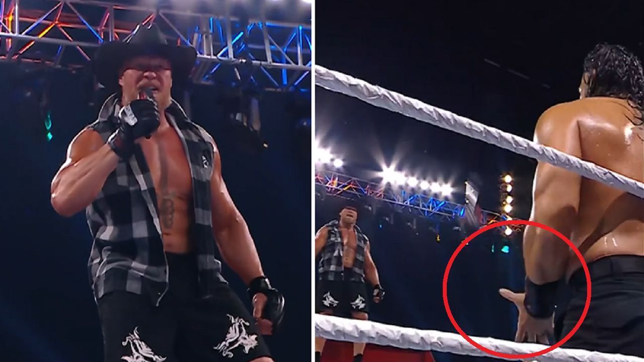 Reigns caught the microphone that Lesnar threw at him after introducing himself.