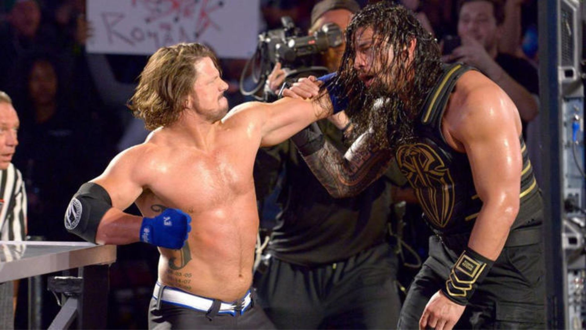 WWE Superstars, AJ Styles and Roman Reigns