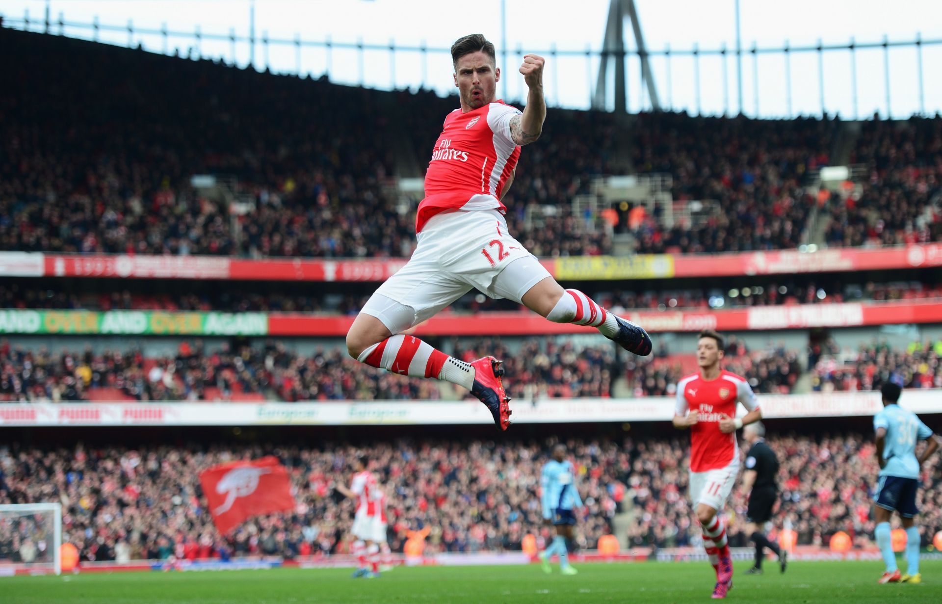 Olivier Giroud celebrates a goal against West Ham - Premier League