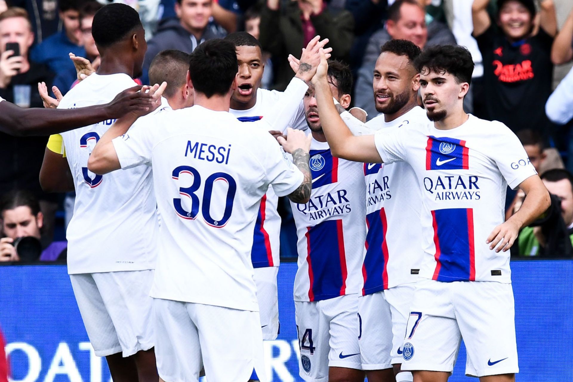 Paris Saint-Germain players celebrate taking the lead against Brest.