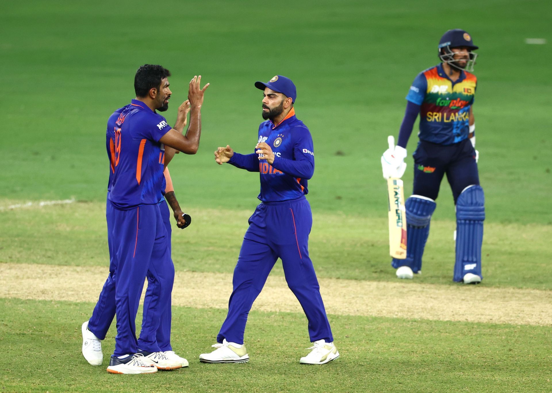 Ravichandran Ashwin (left) has been in and out of Team India’s T20I playing XI. Pic: Getty Images