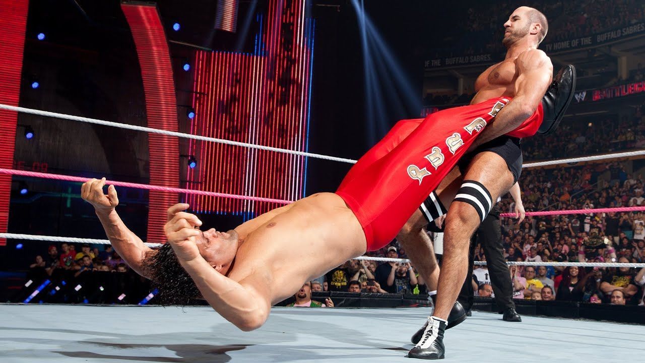 Cesaro showing off his incredible strength by executing the giant swing on The Great Khali