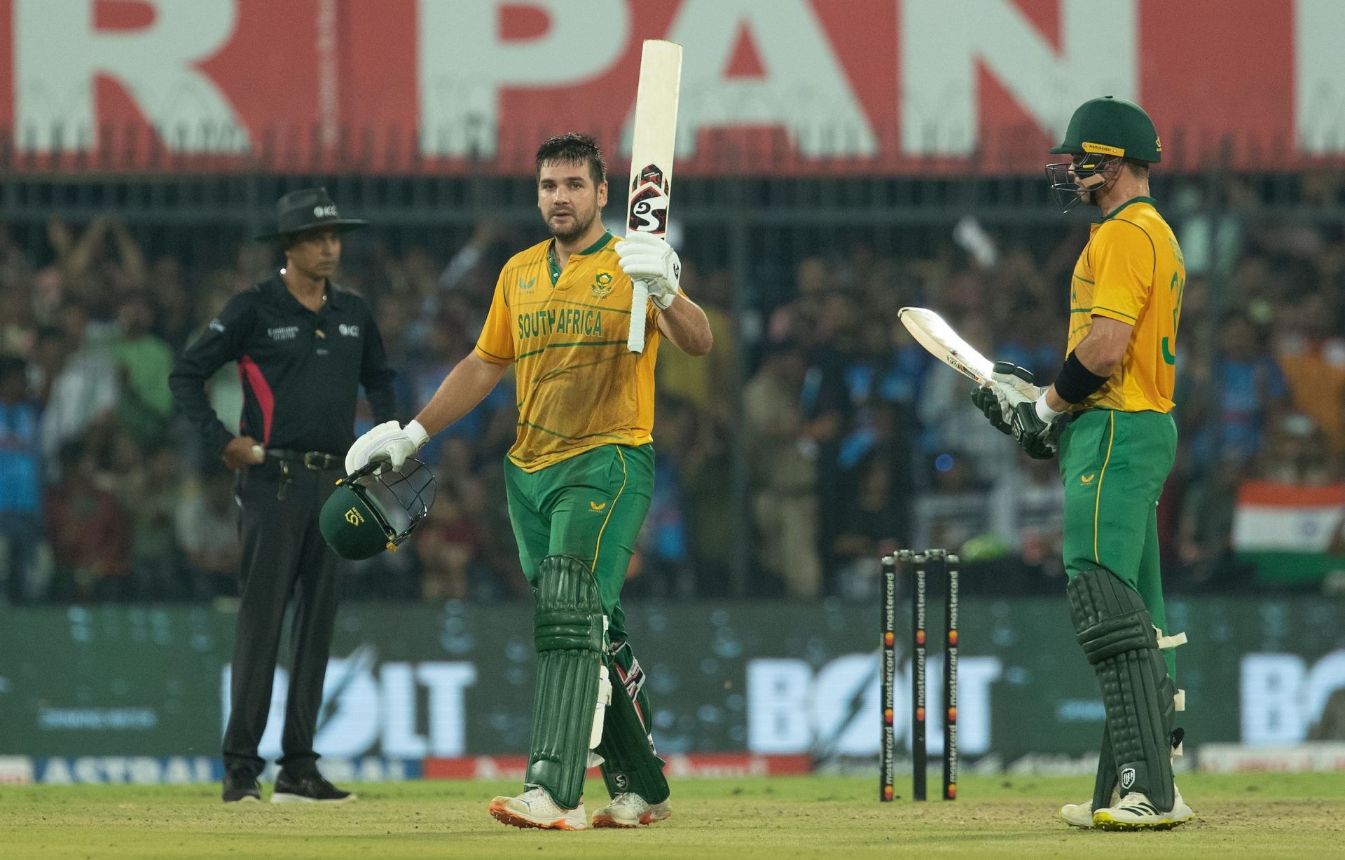 Rilee Rossouw raises his bat after reaching three figures for the first time in a T20I. (Credits: Twitter)