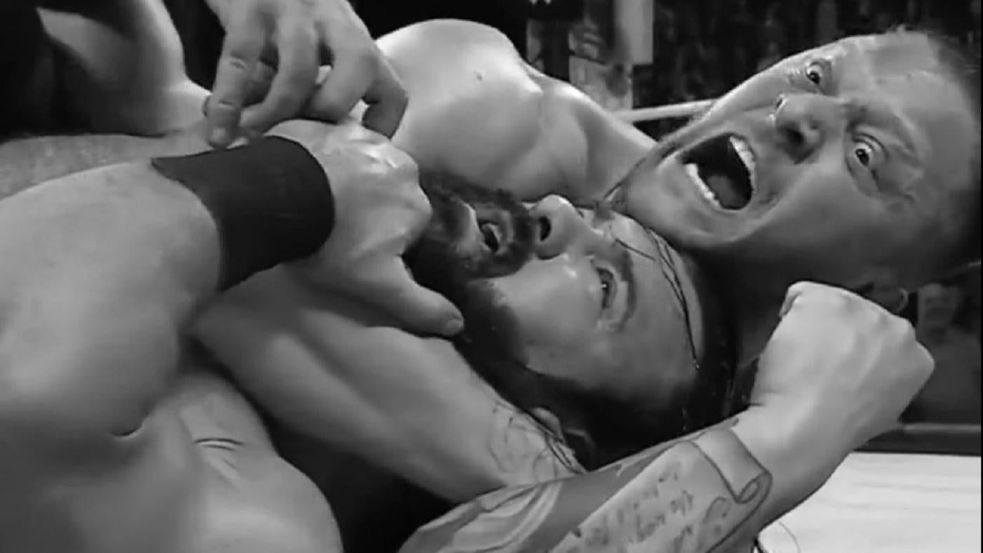 Karrion Kross chokes out Drew McIntyre during a segment on SmackDown.