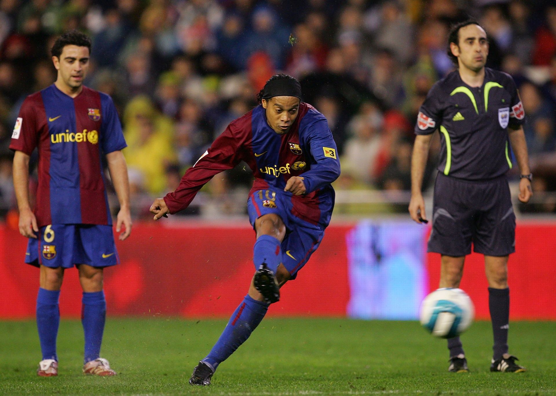 Ronaldinho takes a free kick for Barcelona