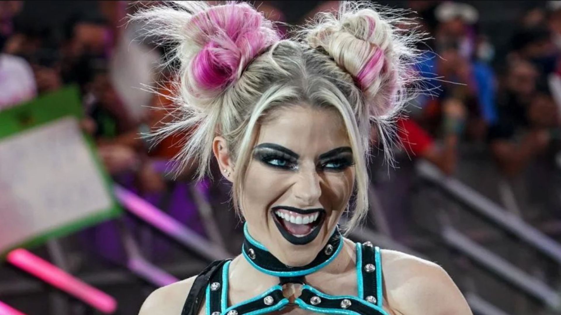 WWE RAW star Alexa Bliss laughing on the entrance ramp