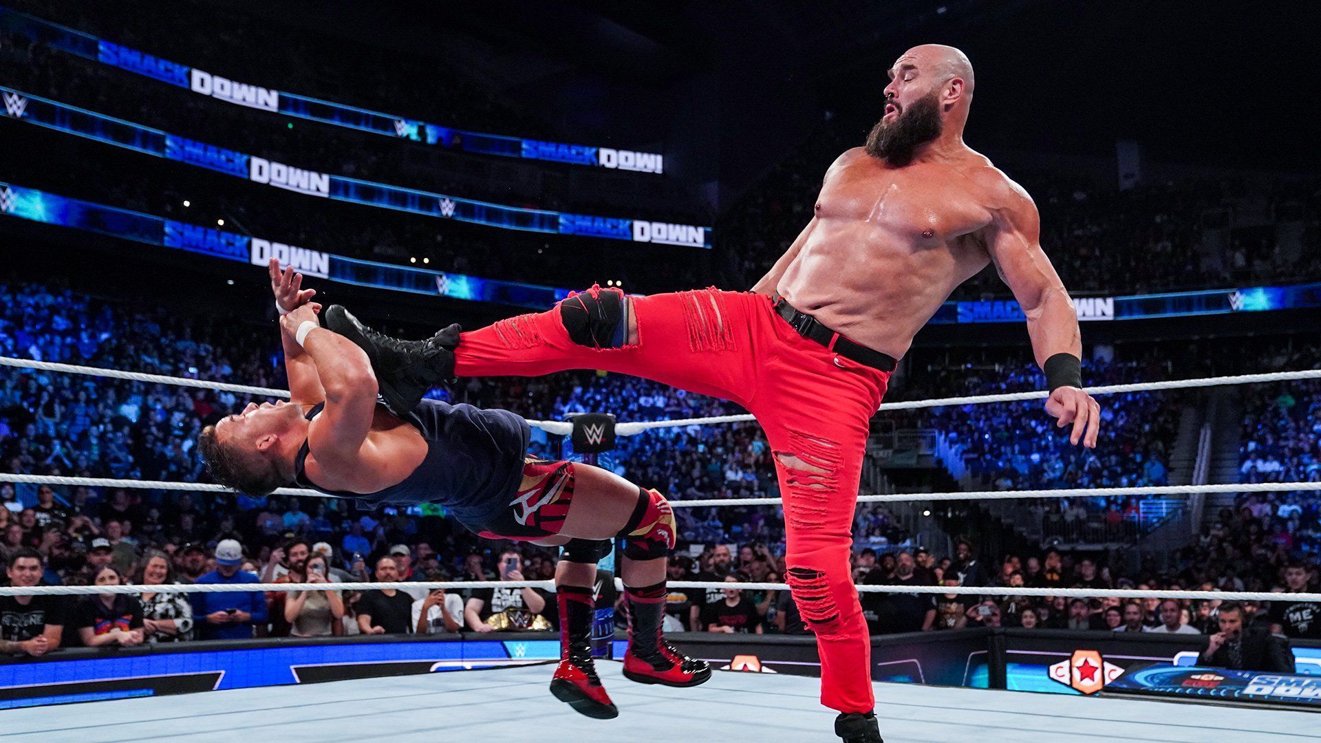 Braun Strowman kicking Chad Gable