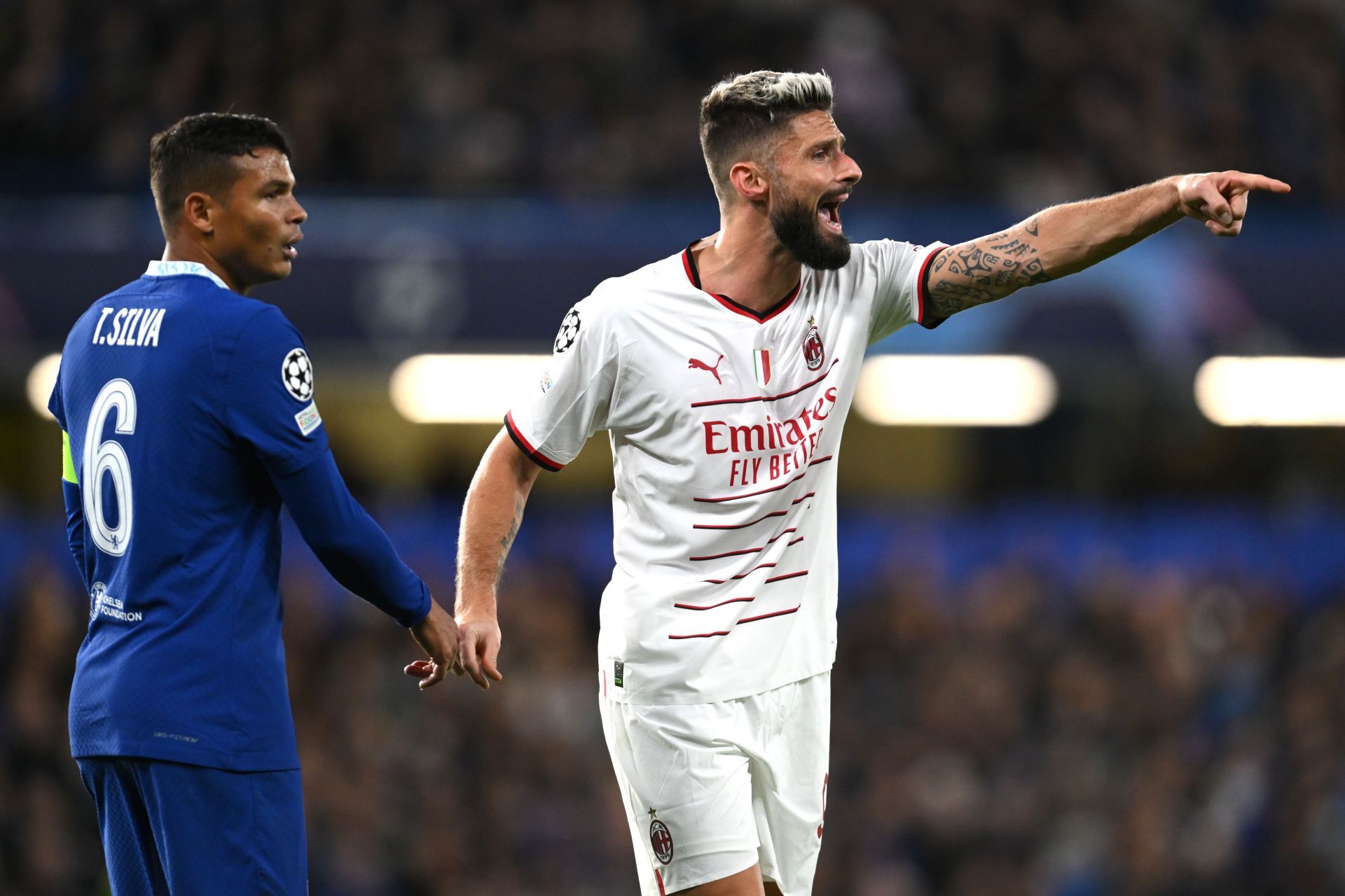 Olivier Giroud (right) was starved of chances on his return to Stamford Bridge