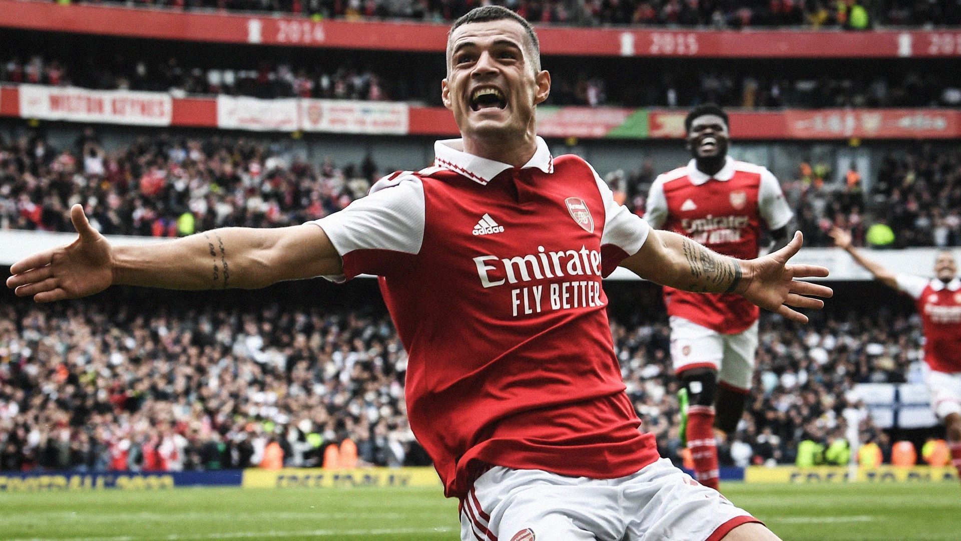 Granit Xhaka celebrates his second goal of the season, and Arsenal's third against North London rivals Tottenham Hotspur in October 2022.