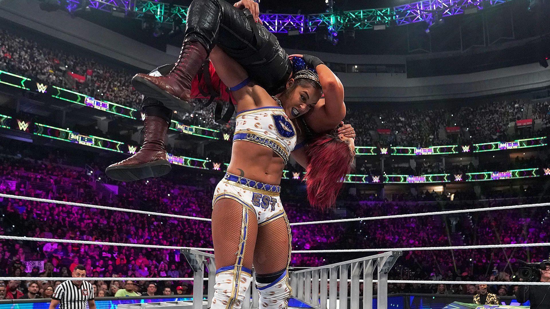 The EST of WWE climbed the ladder to retain her Women's title