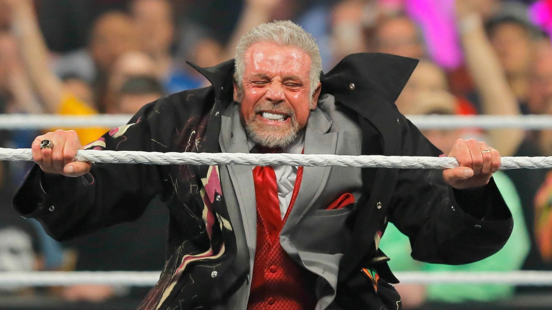 The Ultimate Warrior posing in the ring during a WWE appearance