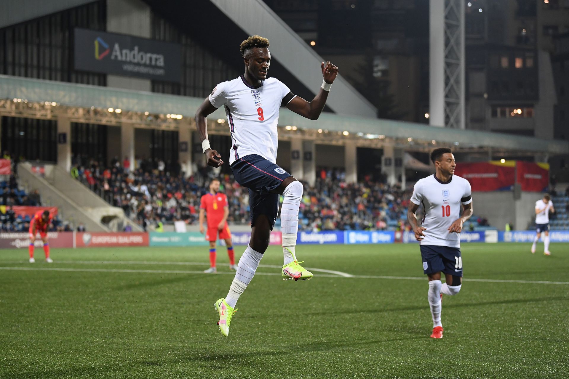 Tammy Abraham celebrates scoring for the Three Lions in a 2022 FIFA World Cup Qualifier against Andorra